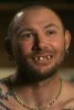 26452602-8157351-Hidden_smile_He_actually_got_his_new_chompers_in_July_of_2019_bu-m-51_1585258...jpg